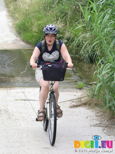 SX27586 Jenni after cycling through stream